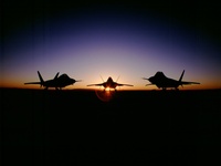 Raptor fighter planes sunset USA air force